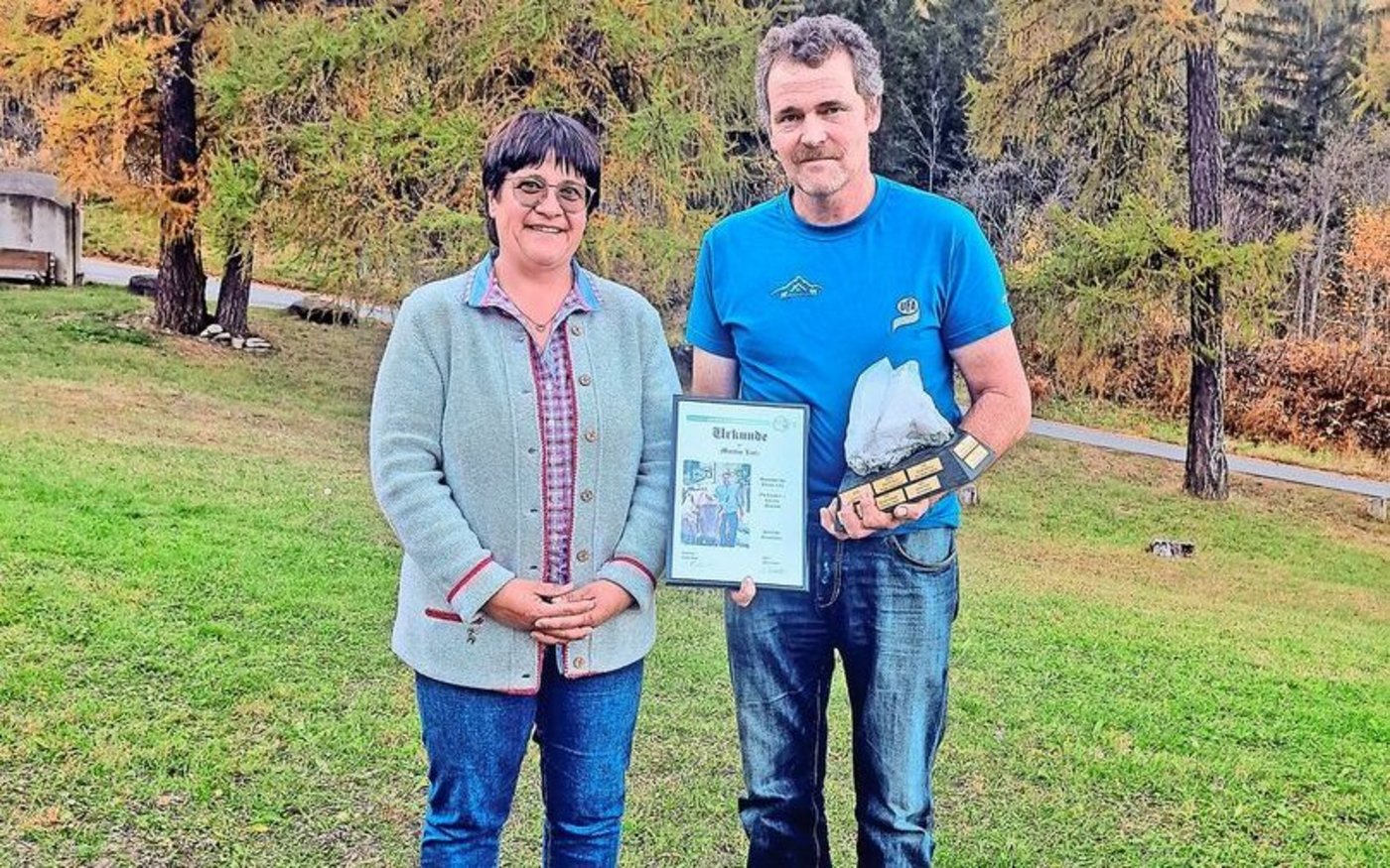 Christa Buchli mit dem Alpmeister 2024 Martin Lutz.