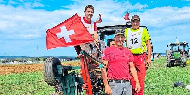 Das Schweizer Team mit Marco Angst (l.) und Peter Ulrich (r.) mit ihrem Trainer Stefan Spring.