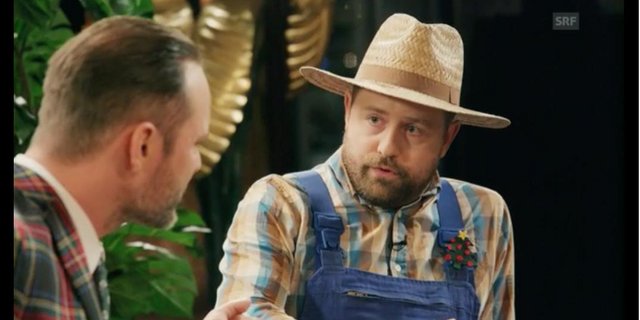 Wolfgang Imholz Nussbaum zu Gast bei Schweizer Komiker Dominic Deville. (Screenshot SRF)