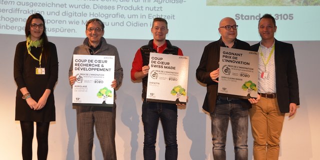 Patrice Walpen, Präsident der Agrovina (ganz rechts) übergibt die Preise und Ehrungen der Messe an die Firmen Qualitiy Wine und Felco, sowie die Universität Genf. (Bild zVg) 