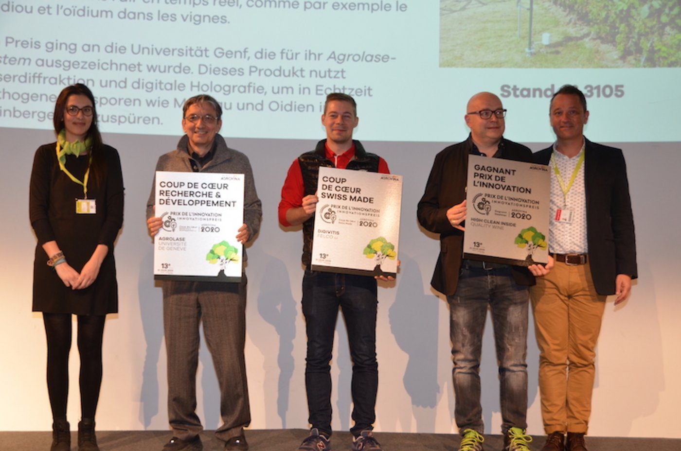 Patrice Walpen, Präsident der Agrovina (ganz rechts) übergibt die Preise und Ehrungen der Messe an die Firmen Qualitiy Wine und Felco, sowie die Universität Genf. (Bild zVg) 